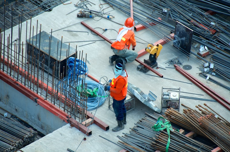 Construction workers on scaffolding at height